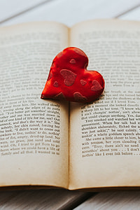 Little red heart with an old book thumbnail