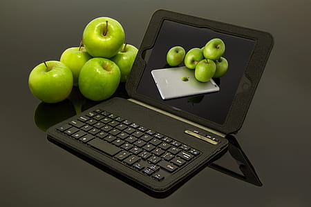 Black Laptop Computer Beside Green Apples thumbnail