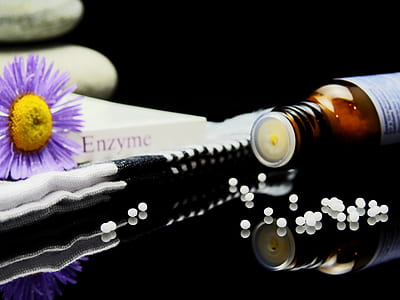 purple flower near bottle thumbnail