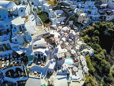 Aerial Photo of White Buildings Near Trees at Daytime thumbnail