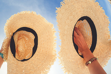 two round brown sunhats thumbnail