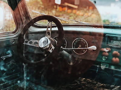 black and gray car steering wheel thumbnail