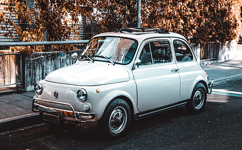 White Coupe parked on a Street thumbnail
