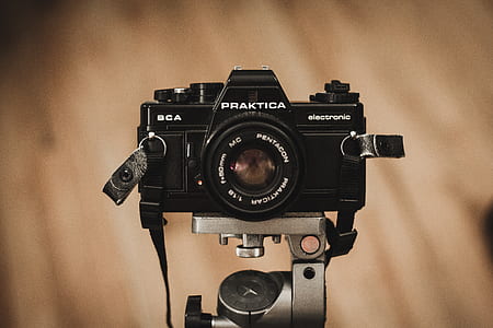 focused photo of a black Praxtica camera thumbnail