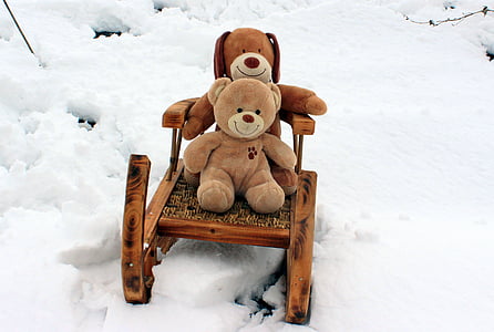 two brown bear plush toys riding sleigh thumbnail