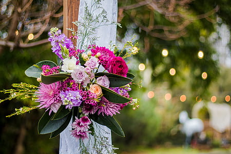 assorted flowers on white textile thumbnail