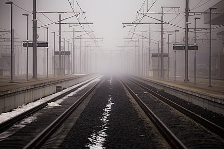 train rail covered with smog thumbnail