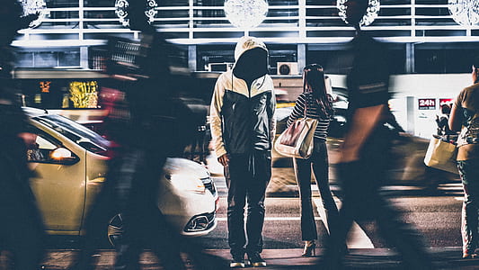 person wearing black and white zip-up hoodie thumbnail