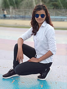woman crouching on floor thumbnail