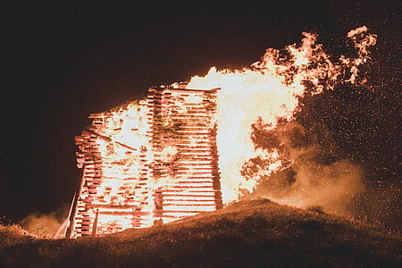 burned shed during night time thumbnail