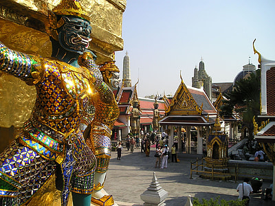 person in gold-colored armor statue thumbnail