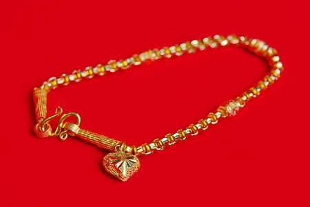 gold-colored bracelet thumbnail