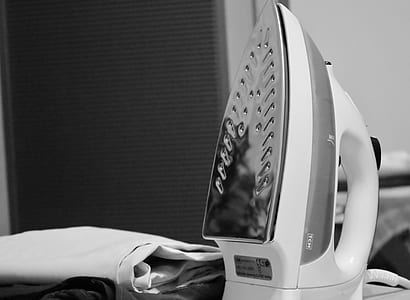 grayscale photography of clothes iron and textile thumbnail