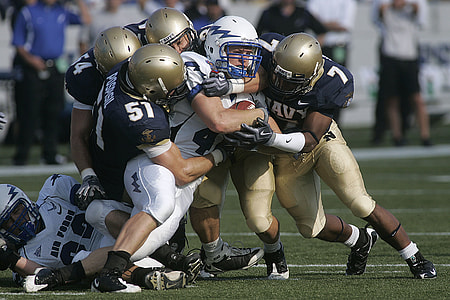 football players on football field thumbnail