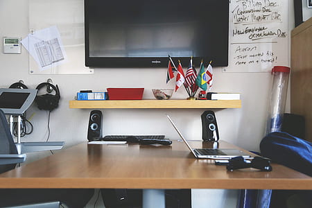 flat screen television over beige wooden wall shelf thumbnail