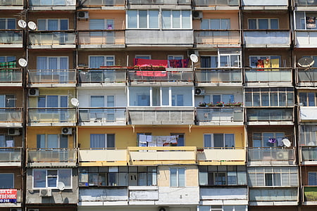 beige and white concrete building during daytime thumbnail