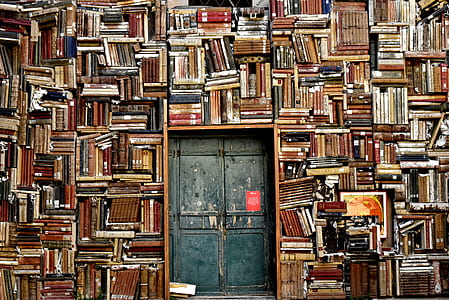 photo of wall book and black door thumbnail