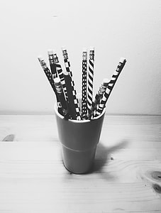 gray scale photo of pencils in container thumbnail