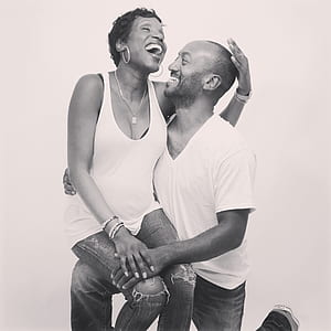 woman on man's lap photo thumbnail