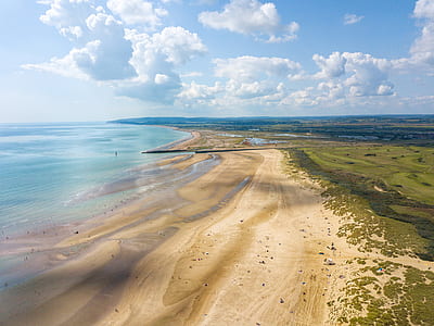 aerial photography of body of water and land thumbnail