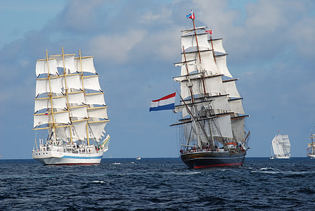 photo of two white and blue Sail Ship thumbnail