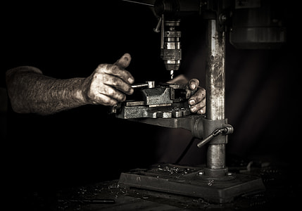 man holding power tool thumbnail