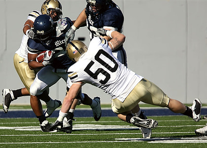 football players on field thumbnail