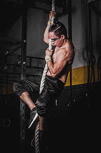 Man Climbing a Rope thumbnail