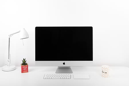 turned off silver iMac with Apple Magic Mouse and Magic Keyboard thumbnail