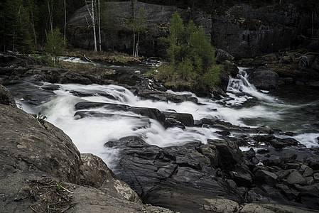 Time-Lapse of cascading water splashing down rocks at Cameron Falls, Ingraham Trail thumbnail
