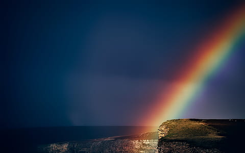 photo of cliff with rainbow thumbnail