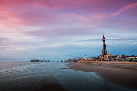 photo of seashore during sunset thumbnail