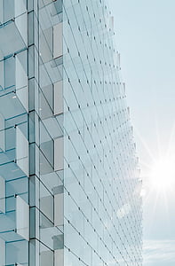 minimalist photography of glass structural building thumbnail