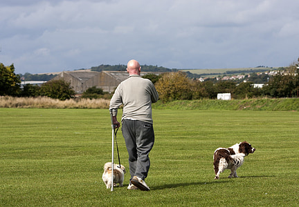 man walking with Pomeranian thumbnail