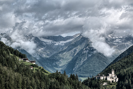 cloudy mountain during day time thumbnail