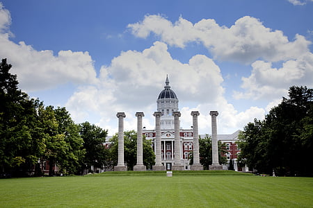 white museum under blue sky thumbnail