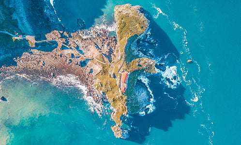 aerial view photography of island during daytime thumbnail