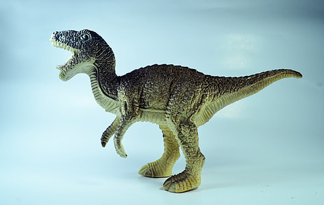 brown dinosaur toy thumbnail
