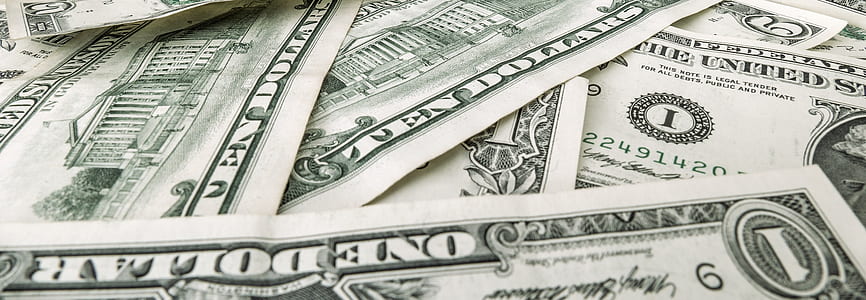 piled-up U.S. dollar banknotes thumbnail