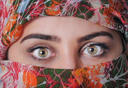 person covered in green, white, and orange textile thumbnail