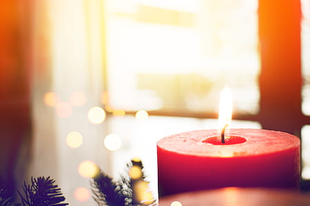 selective focus photography of lighted candle thumbnail