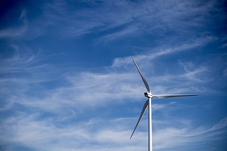 white electric windmill under cirrus clouds thumbnail