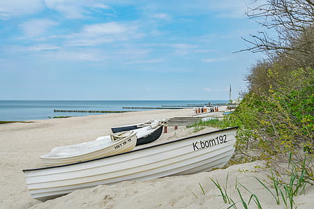 white boats on the beach thumbnail