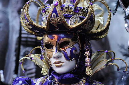 woman wears masquerade mask closeup photo thumbnail