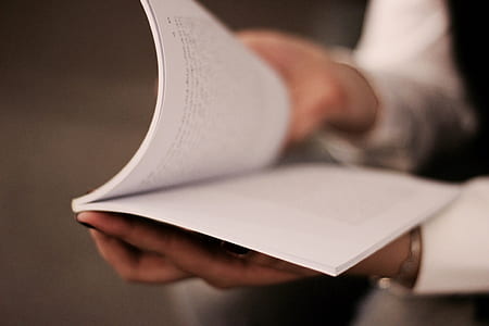 person opening a book thumbnail