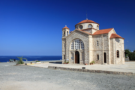 beige cathedral near body of water thumbnail