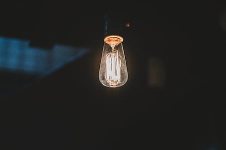 turned on lightbulb in dark room thumbnail