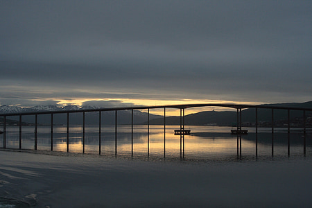 fence near body of water thumbnail