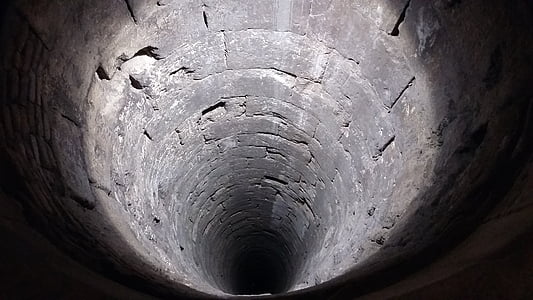 single perspective photography of tunnel thumbnail