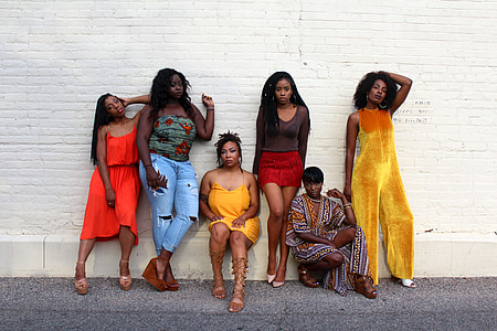 group of woman taking picture together thumbnail
